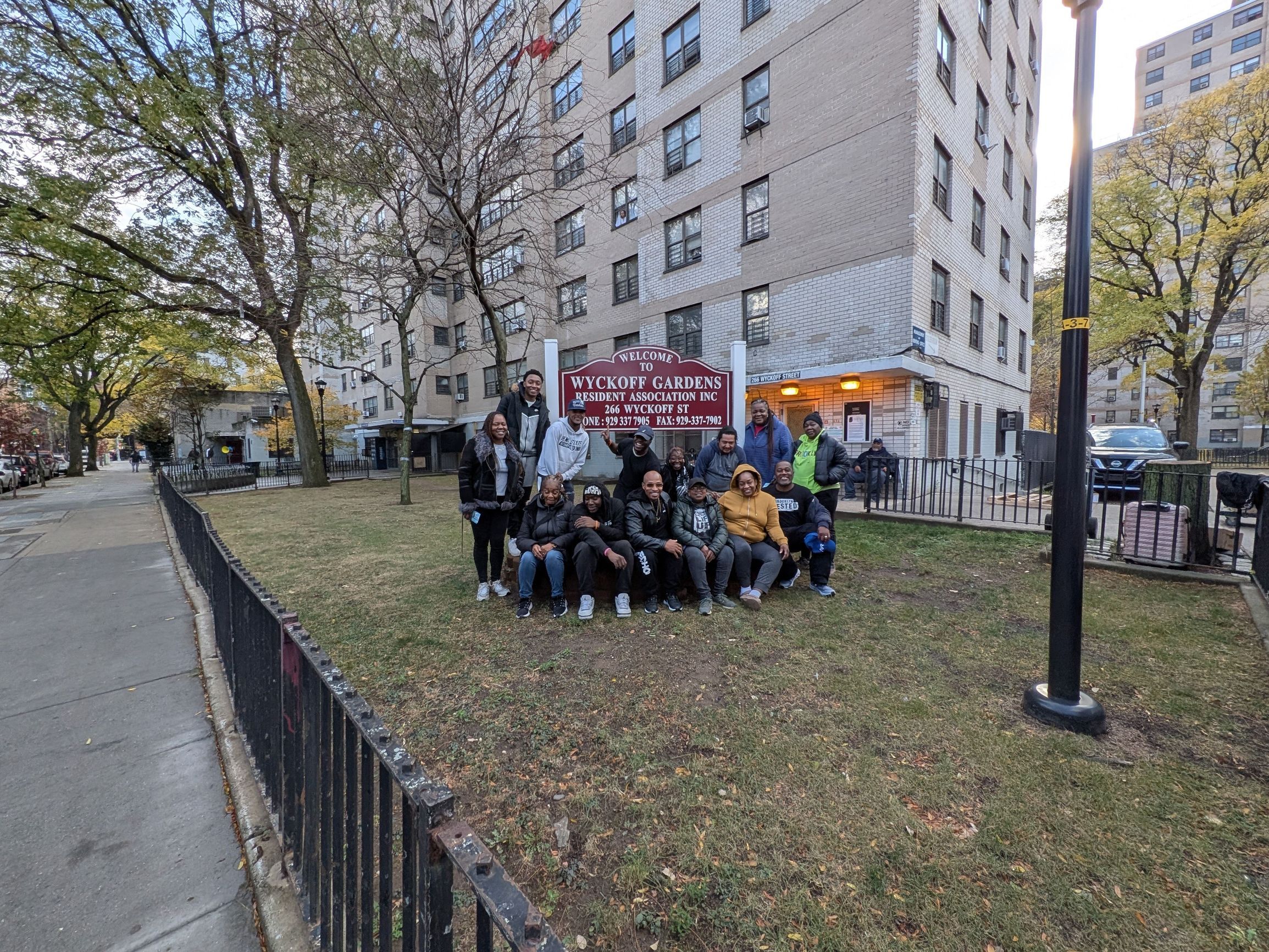 Khari Edwards with community members at Wyckoff Gardens