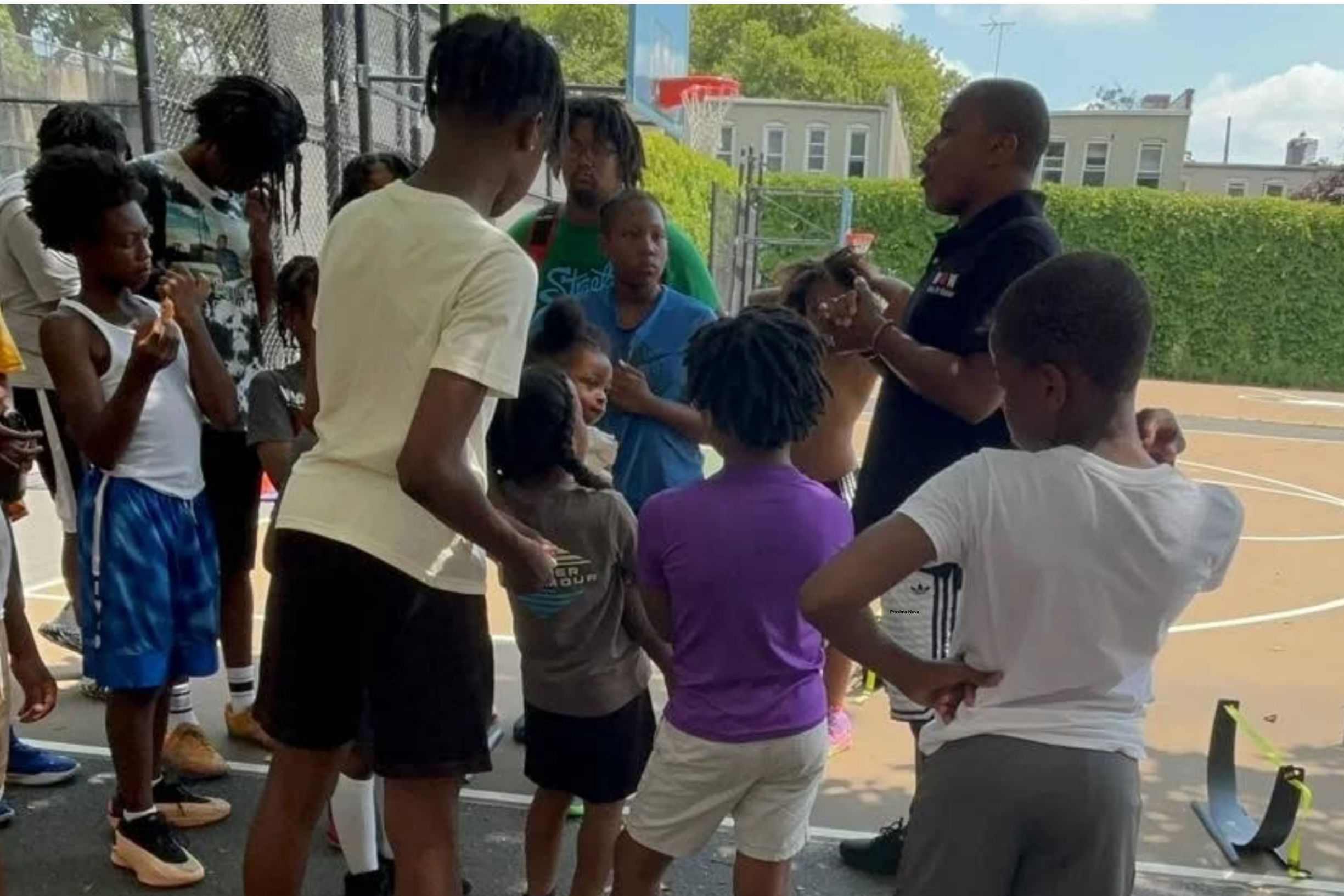 Khari Edwards with youth in Brooklyn - 1